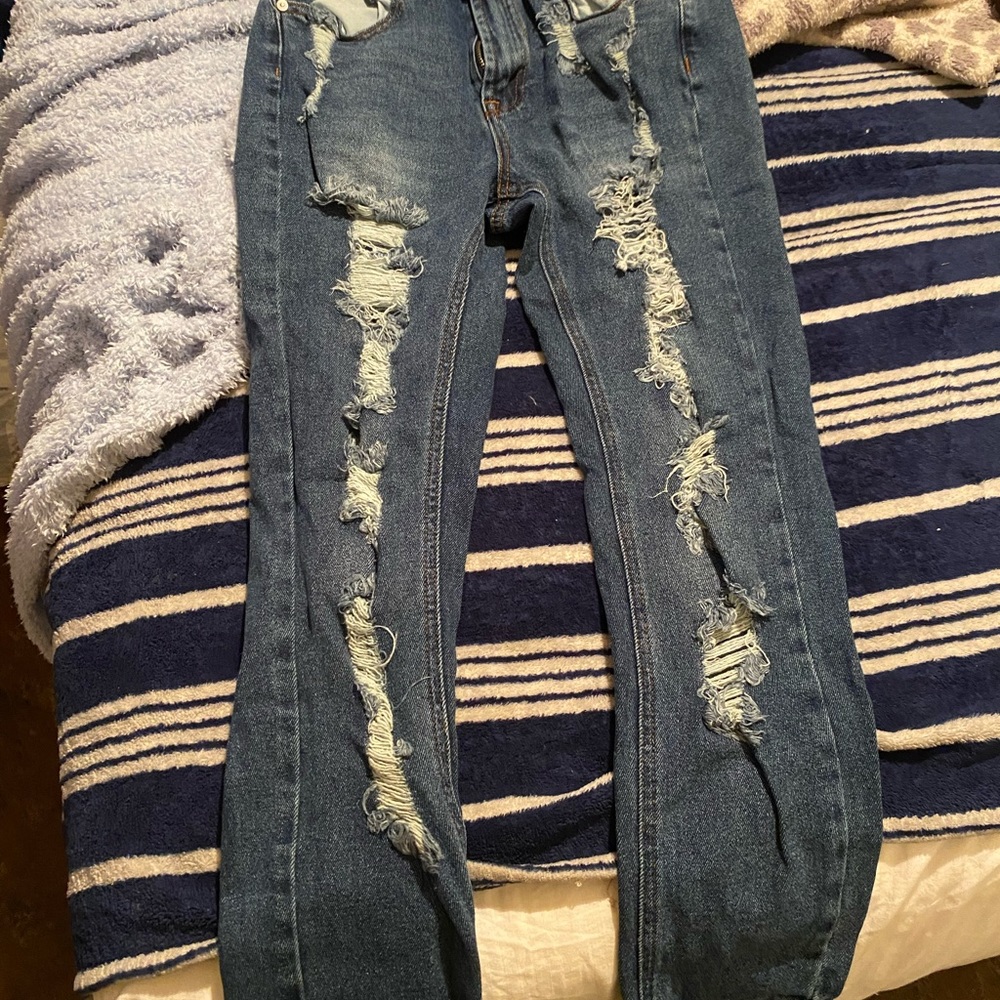 Ripped skinny jeans. Almost famous
